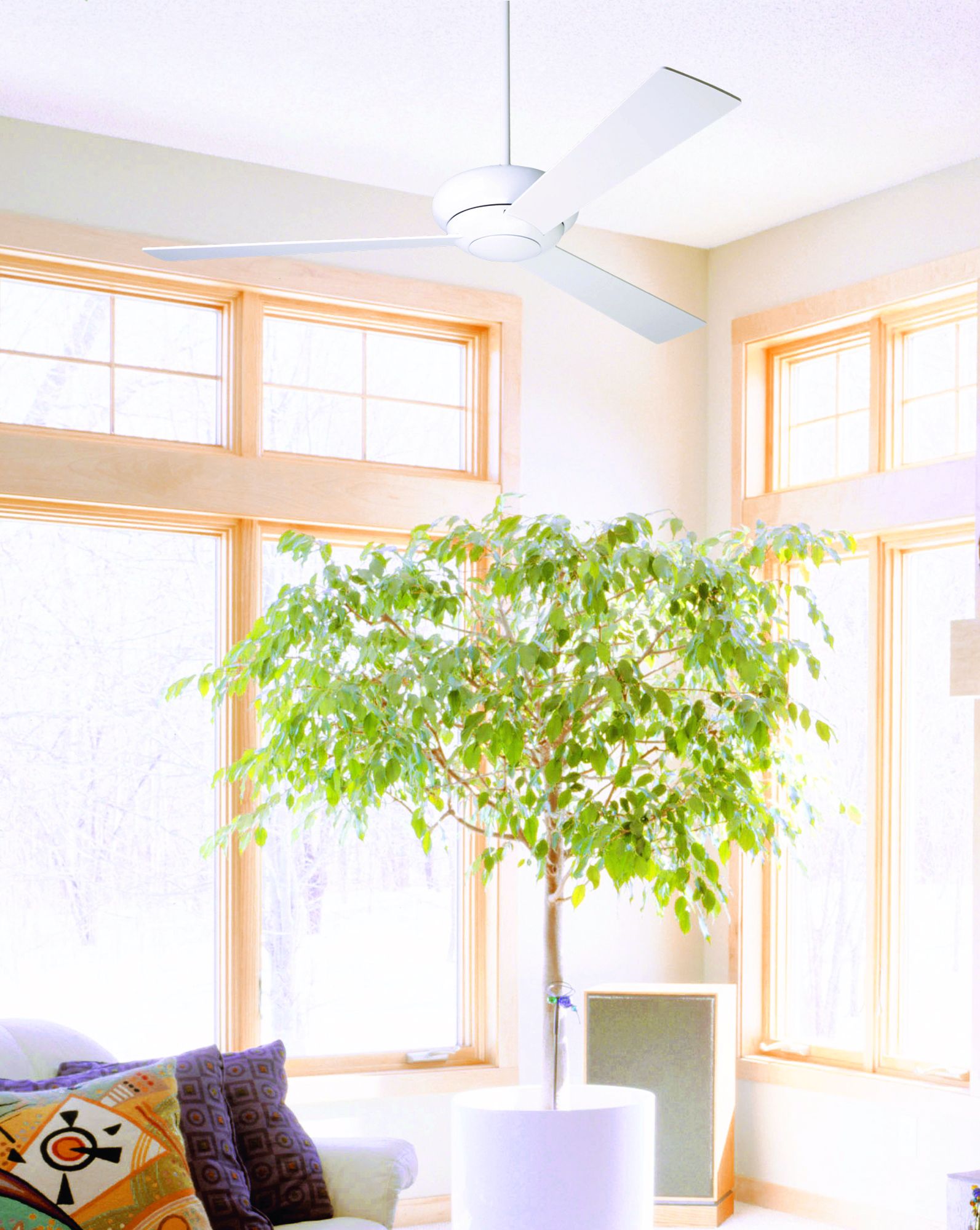 Keep a sunroom feeling cool and fresh with a modern ceiling fan